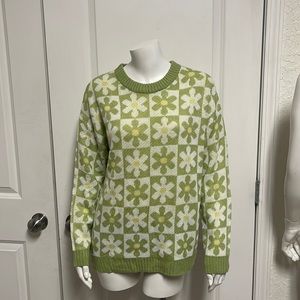 Green and white sweater